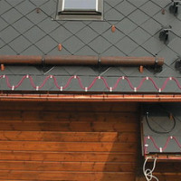 Calefacción de canalones: instalación de bricolaje de un sistema de calefacción de techo y canalón