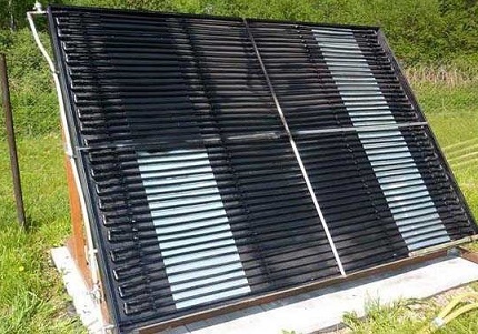 Chauffage solaire d'une maison privée avec collecteurs ouverts